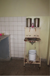 This sink is a hands-free washing and scrub in station for surgery. Notice the foot petals below the station that allow water to flow so that members of the surgical team can scrub-in for surgery. This was designed for a site that did not have reliable running water in eastern Congo